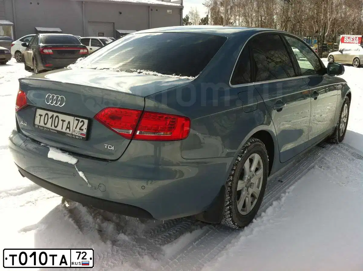 Фото автомобиля VOLKSWAGEN TOUAREG, 2012 — госномер Т010ТА72. Цвет: Белый