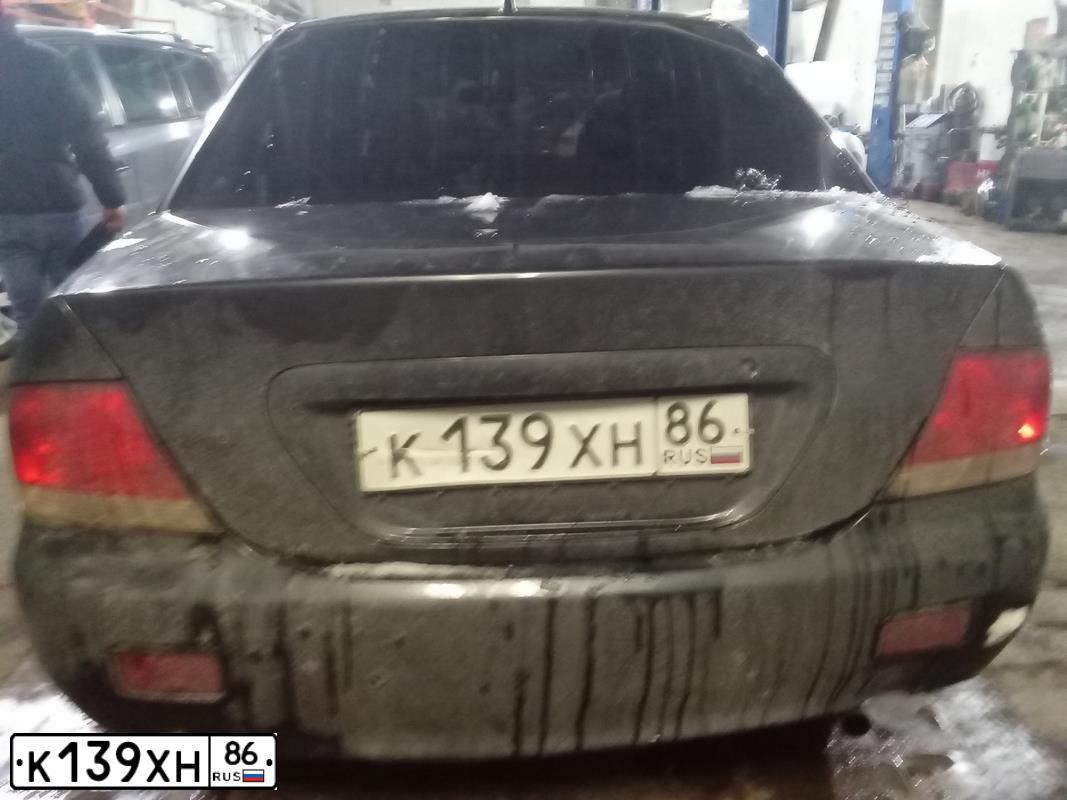 Фото автомобиля MITSUBISHI LANCER, 2004 — госномер В137ХТ147. Цвет: Серый