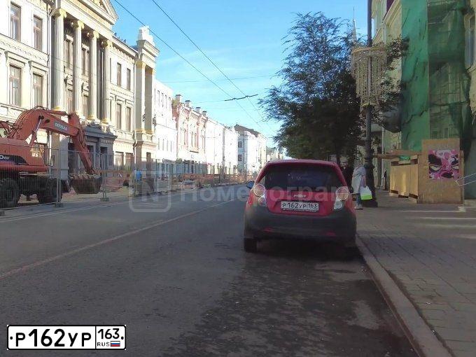 Фото автомобиля KIA SPECTRA, 2007 — госномер Р162УР63. Цвет: ЧЕРНЫЙ