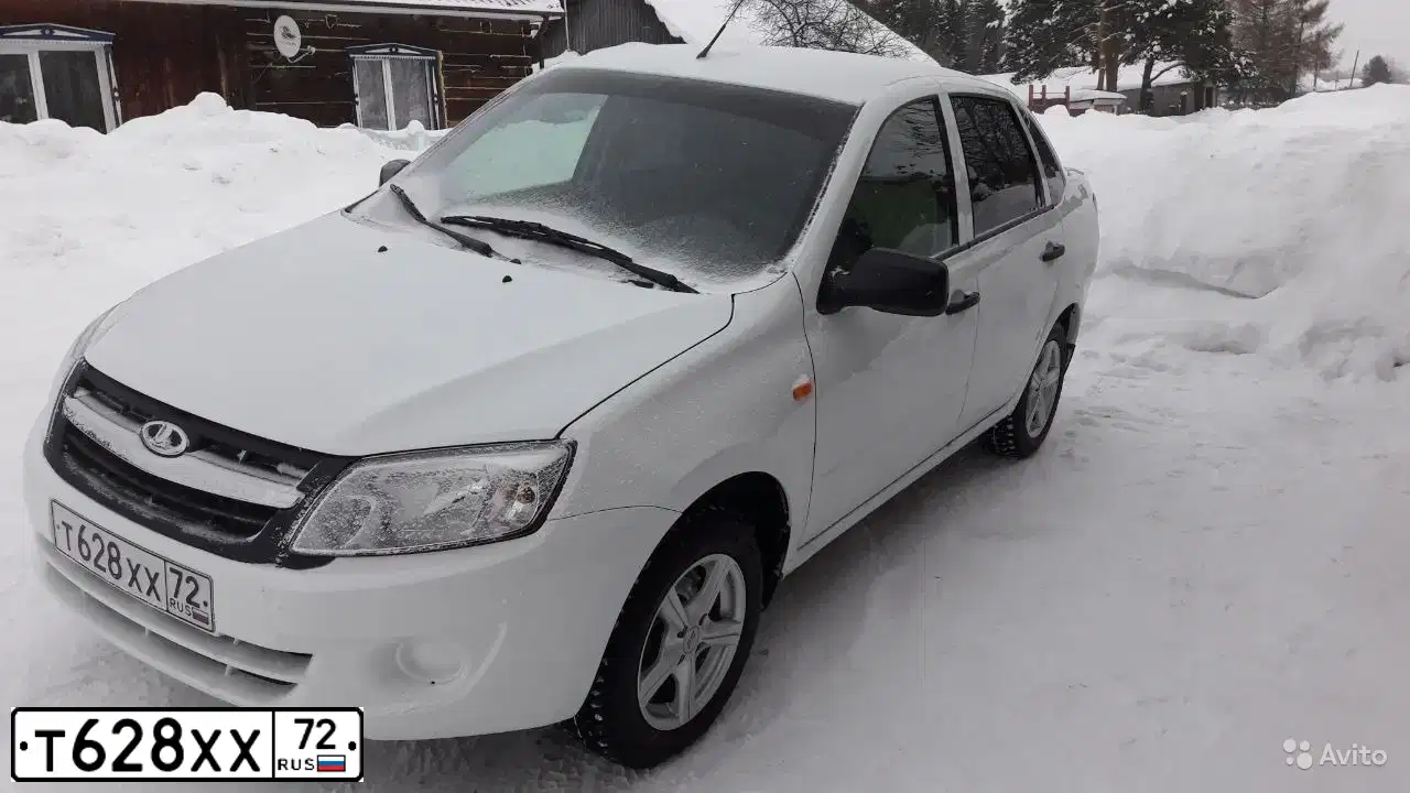 Фото автомобиля LADA 2190 GRANTA, 2013 — госномер А864ВН172. Цвет: БЕЛЫЙ