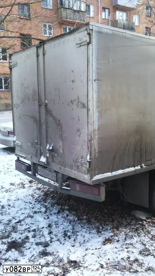 Фото автомобиля GAZ 3302 EL, 1999 — госномер У082ВР124. Цвет: Серый