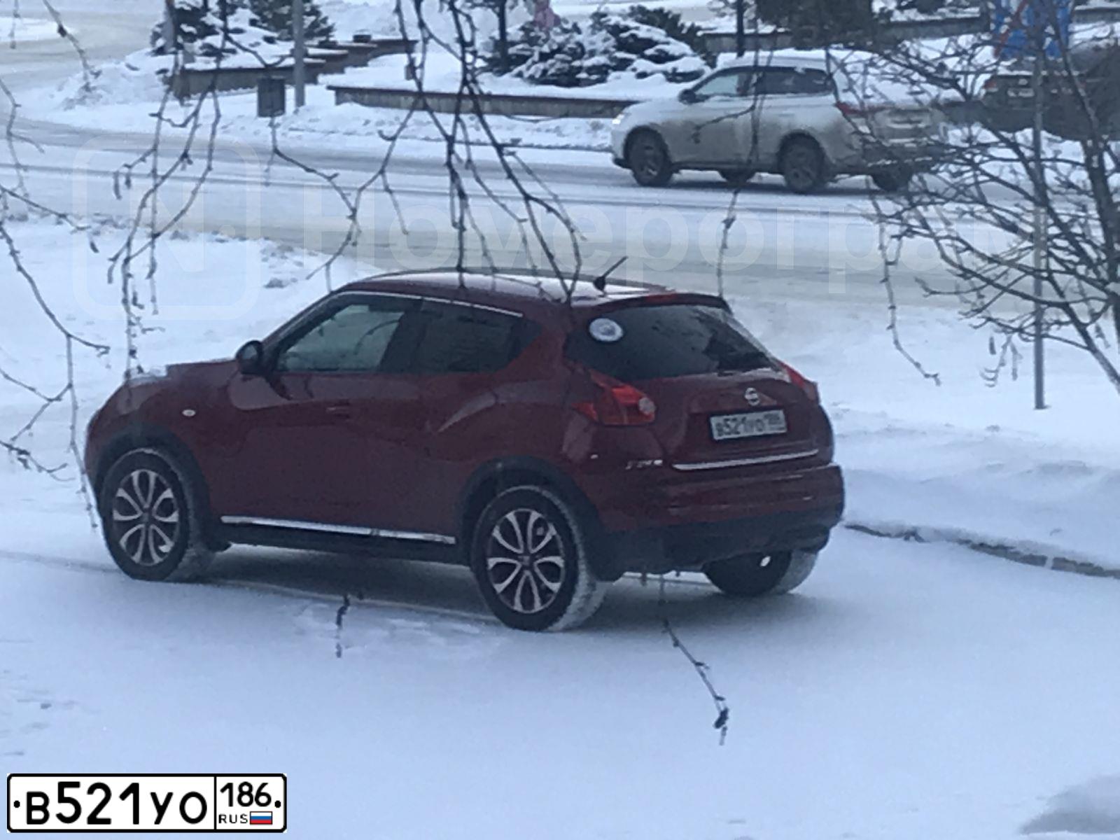Фото автомобиля NISSAN JUKE, 2013 — госномер В521УО186. Цвет: Красный