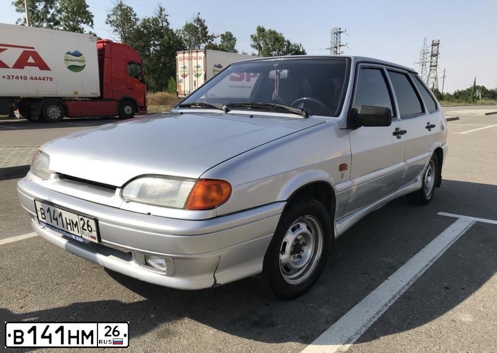 Фото автомобиля LADA 2114 SAMARA, 2005 — госномер В141НМ26. Цвет: СВЕТЛО-СЕРЕБРИСТЫЙ МЕТАЛЛ