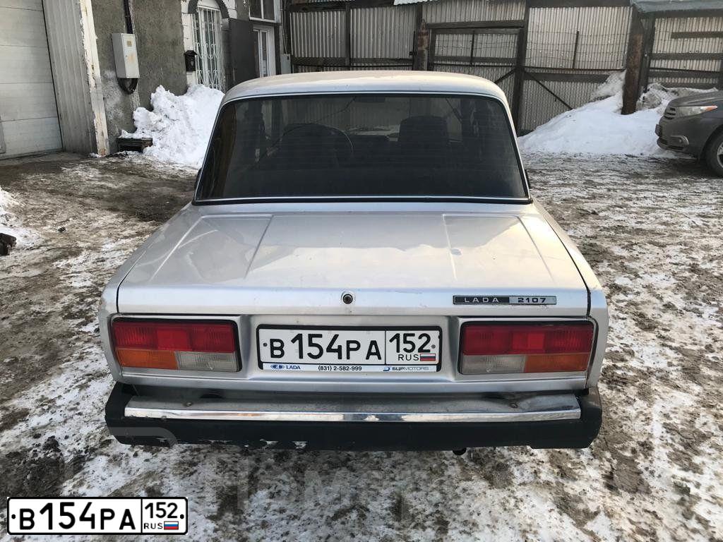 Фото автомобиля LADA 2107, 2010 — госномер Х022ОА152. Цвет: СВЕТЛО-СЕРЫЙ