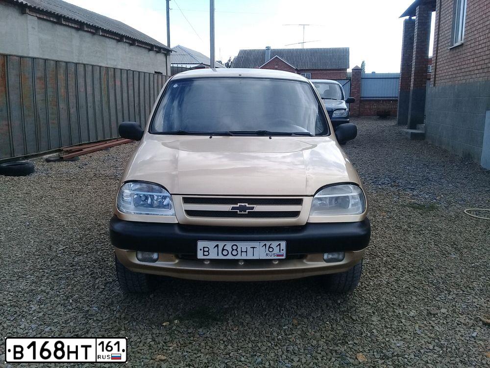 Фото автомобиля CHEVROLET NIVA, 2004 — госномер Р691ВС180. Цвет: БЕЖЕВЫЙ МЕТАЛЛИК