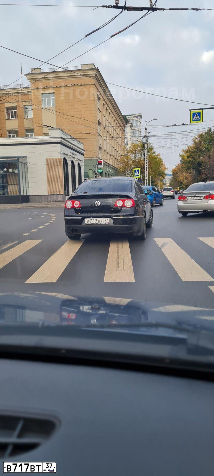 Фото автомобиля VOLKSWAGEN PASSAT, 2008 — госномер Е143РХ154. Цвет: ЧЕРНЫЙ