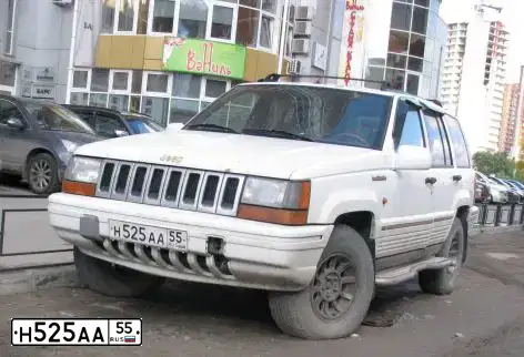 Фото автомобиля JEEP ДЖИП ГРАНД ЧЕРОКИ, 1993 — госномер Н525АА55. Цвет: Белый