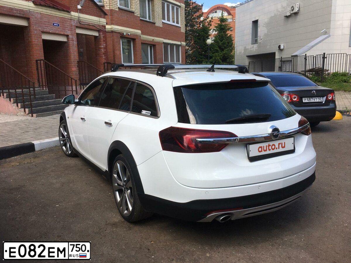 Фото автомобиля OPEL INSIGNIA, 2013 — госномер Р964КУ40. Цвет: Белый