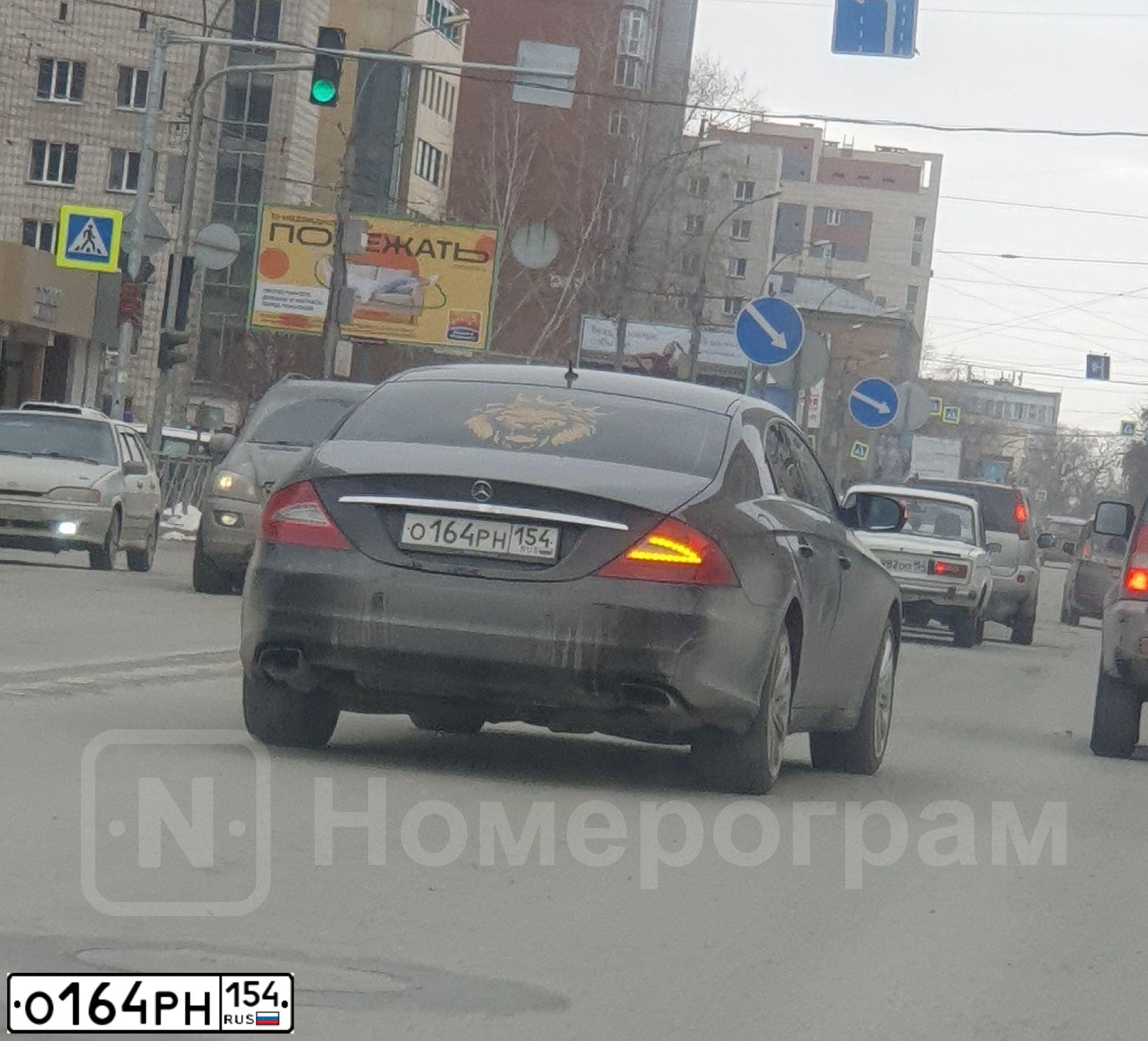 Фото автомобиля MERCEDES CLS-KLASSE, 2008 — госномер О164РН154. Цвет: ЧЕРНЫЙ