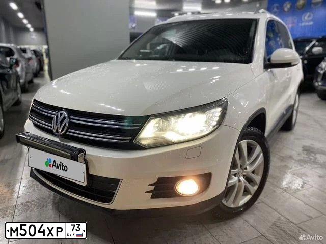 Фото автомобиля VOLKSWAGEN TIGUAN, 2012 — госномер А119УК750. Цвет: Белый