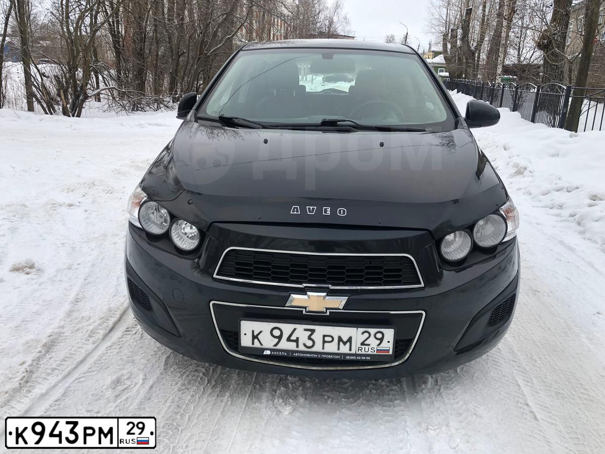 Фото автомобиля CHEVROLET AVEO, 2012 — госномер О702ХР29. Цвет: ЧЕРНЫЙ