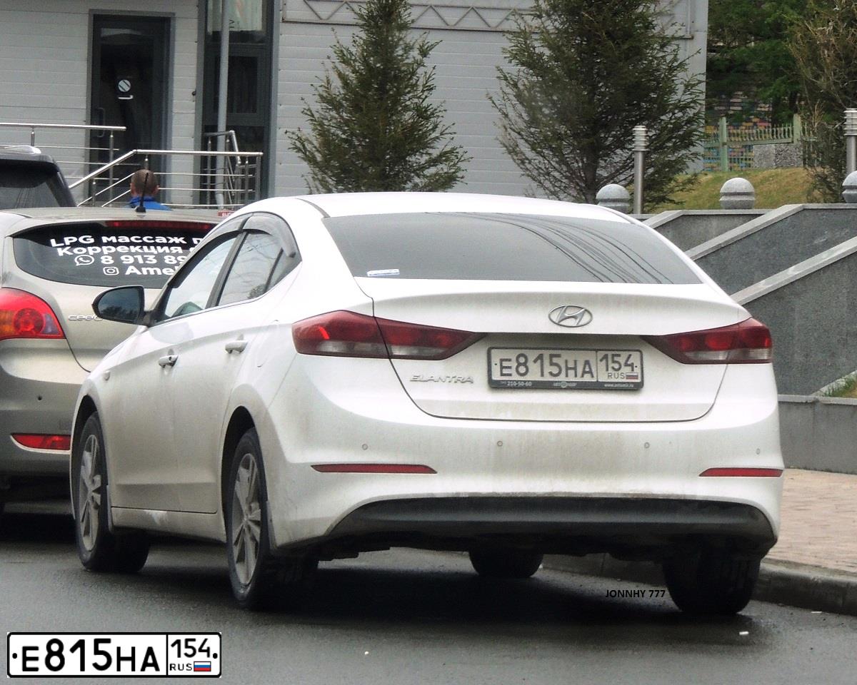 Фото автомобиля HYUNDAI ELANTRA, 2016 — госномер Е815НА154. Цвет: БЕЛЫЙ