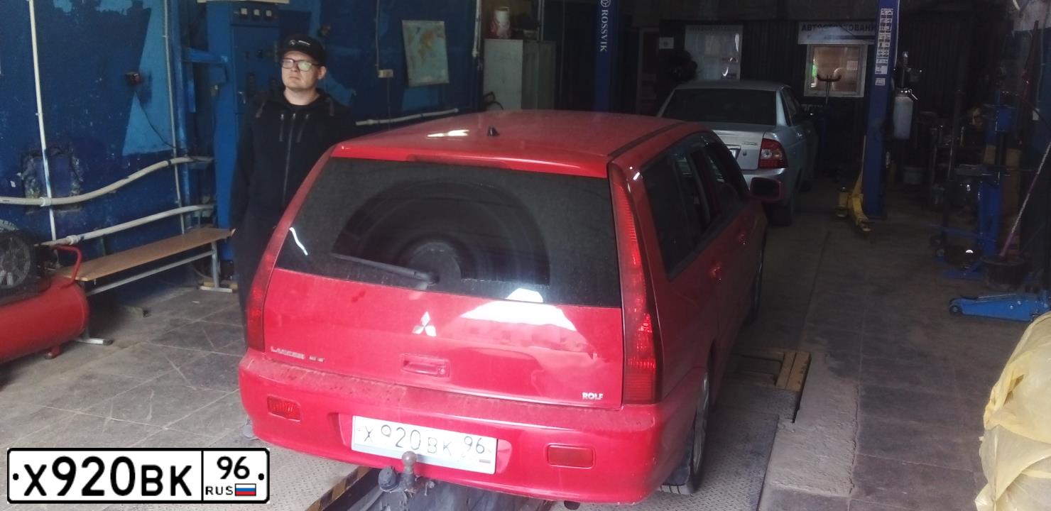 Фото автомобиля MITSUBISHI LANCER, 2005 — госномер О691РУ159. Цвет: Красный