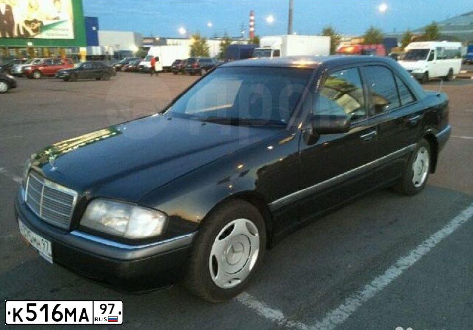 Фото автомобиля MITSUBISHI LANCER, 1993 — госномер К516МА97. Цвет: СЕРЫЙ