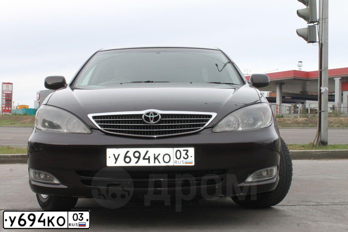 Фото автомобиля TOYOTA CAMRY, 2003 — госномер У694КО03. Цвет: ТЕМНО-КОРИЧНЕВЫЙ