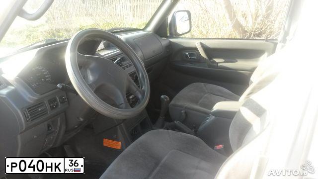 Фото автомобиля MITSUBISHI PAJERO, 2002 — госномер Р040НК36. Цвет: СЕРЫЙ