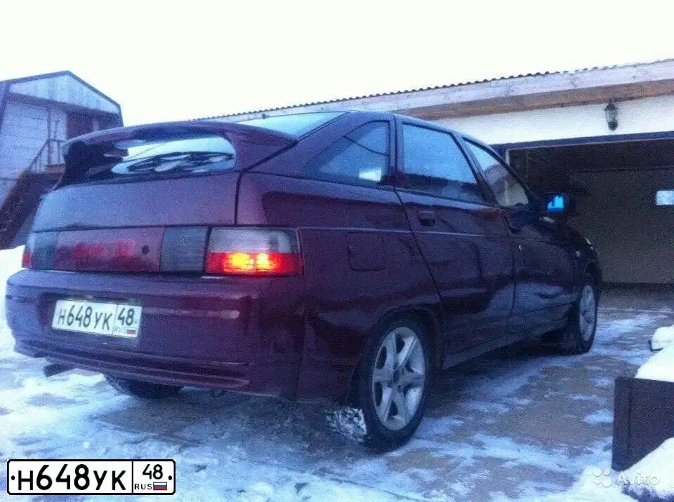 Фото автомобиля LADA 2112, 2002 — госномер Н648УК48. Цвет: СЕРЕБРИСТО-КРАС