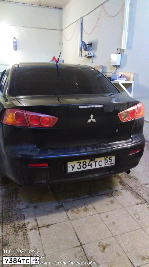 Фото автомобиля MITSUBISHI LANCER, 2008 — госномер М485ЕО72. Цвет: ЧЕРНЫЙ