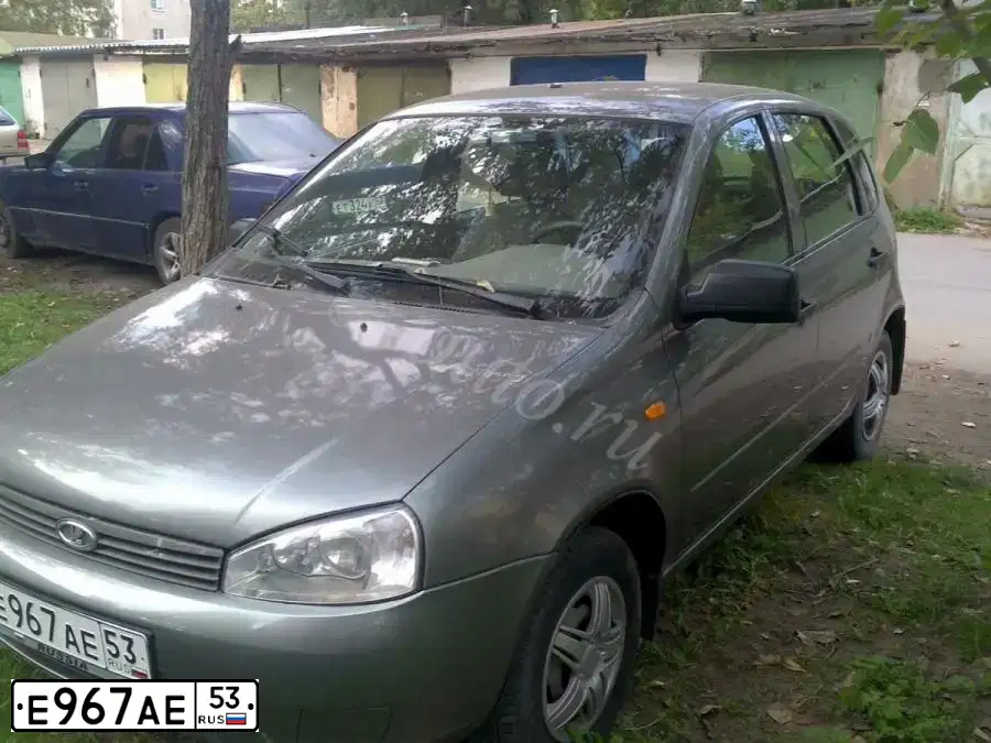 Фото автомобиля LADA 1119 KALINA, 2010 — госномер Е967АЕ53. Цвет: ТЕМНО-СЕРЫЙ МЕТАЛЛИК