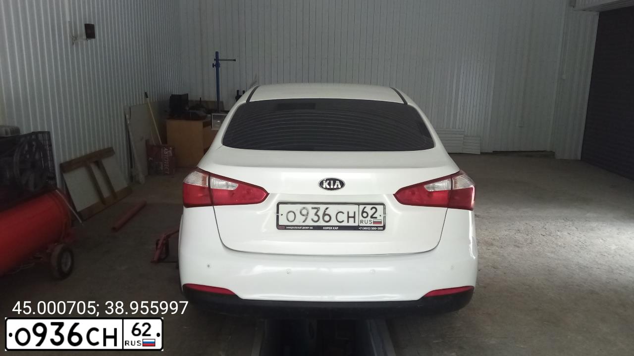 Фото автомобиля KIA CERATO, 2014 — госномер О129КС196. Цвет: Белый