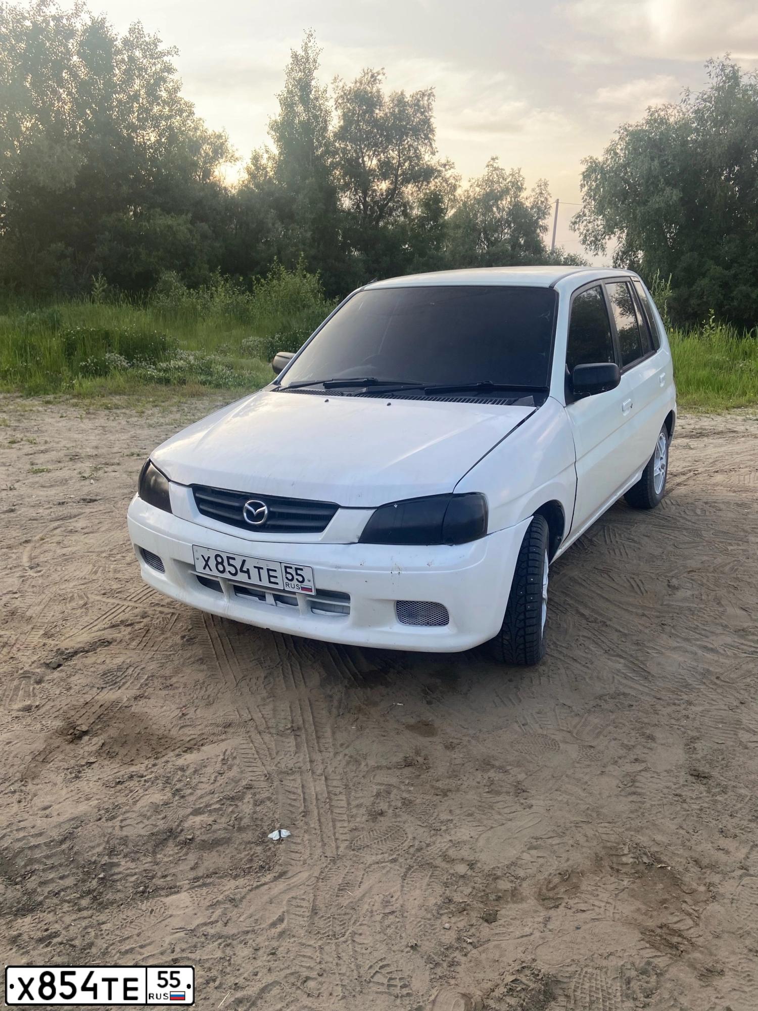 Фото автомобиля MAZDA DEMIO, 2000 — госномер Х854ТЕ55