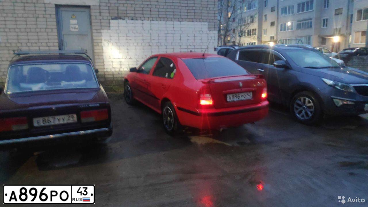 Фото автомобиля SKODA OCTAVIA, 2008 — госномер О062ХТ29. Цвет: Красный