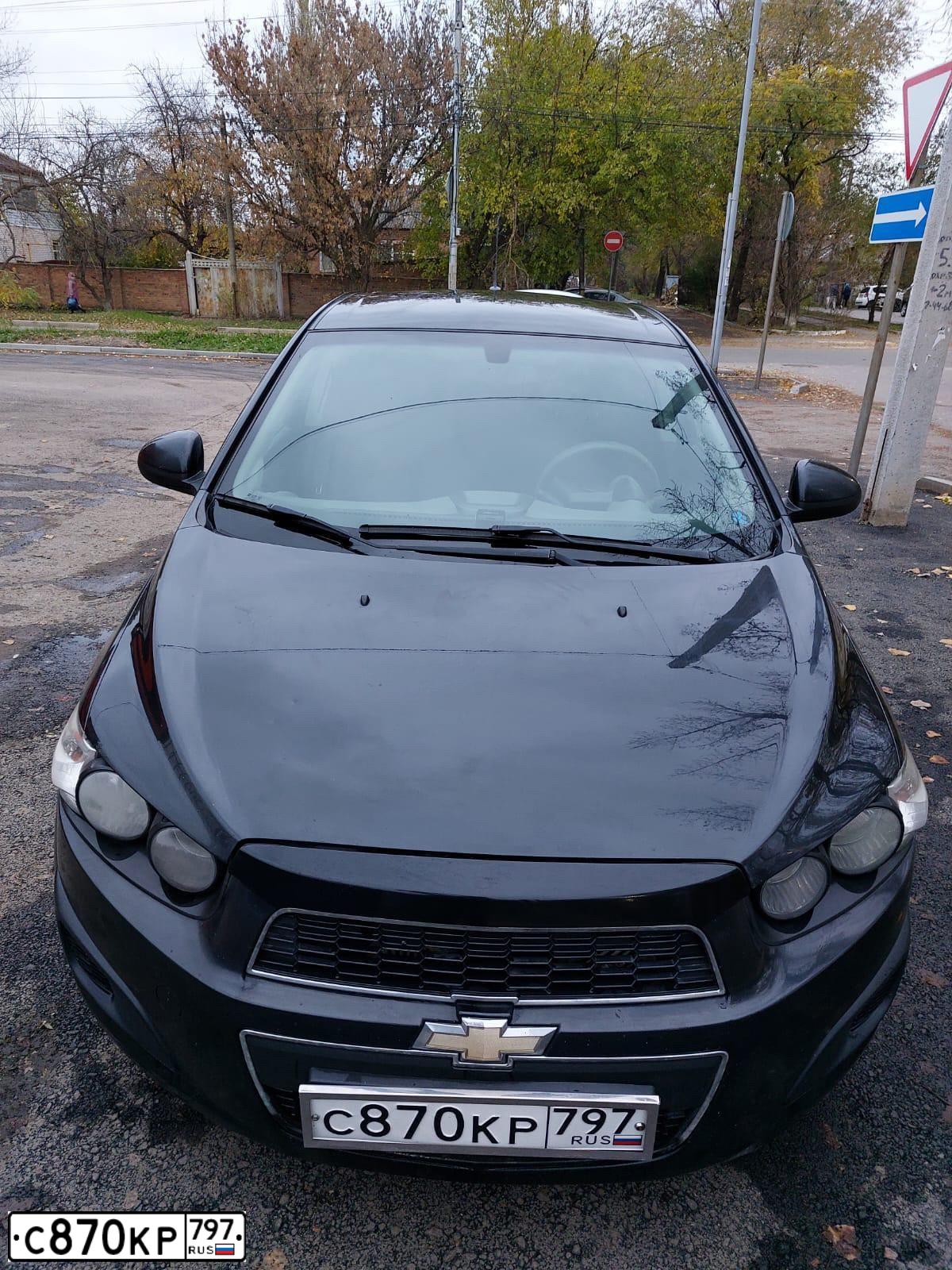 Фото автомобиля CHEVROLET AVEO, 2012 — госномер К798ОЕ161. Цвет: ЧЕРНЫЙ