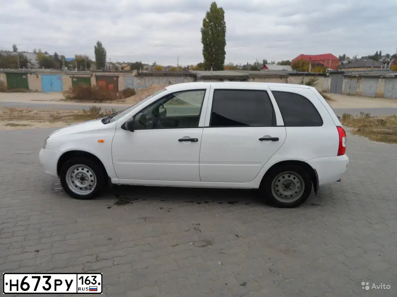 Фото автомобиля LADA 1117 KALINA, 2010 — госномер Н673РУ163. Цвет: Белый