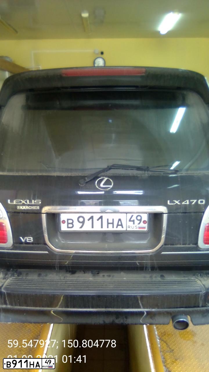 Фото автомобиля LEXUS LX, 2001 — госномер В911НА49. Цвет: ЧЕРНЫЙ