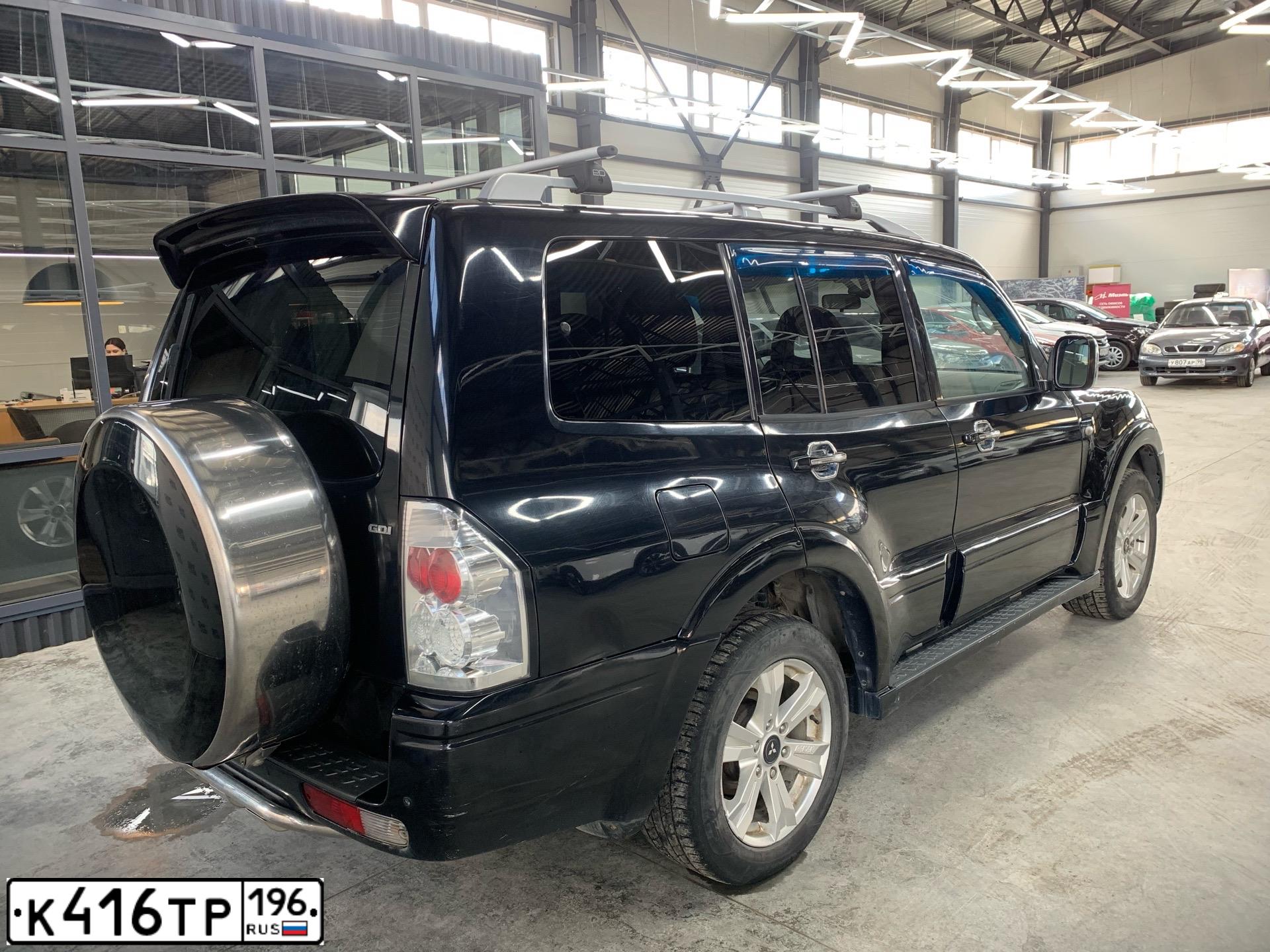 Фото автомобиля MITSUBISHI PAJERO, 2006 — госномер К416ТР196. Цвет: ЧЕРНЫЙ