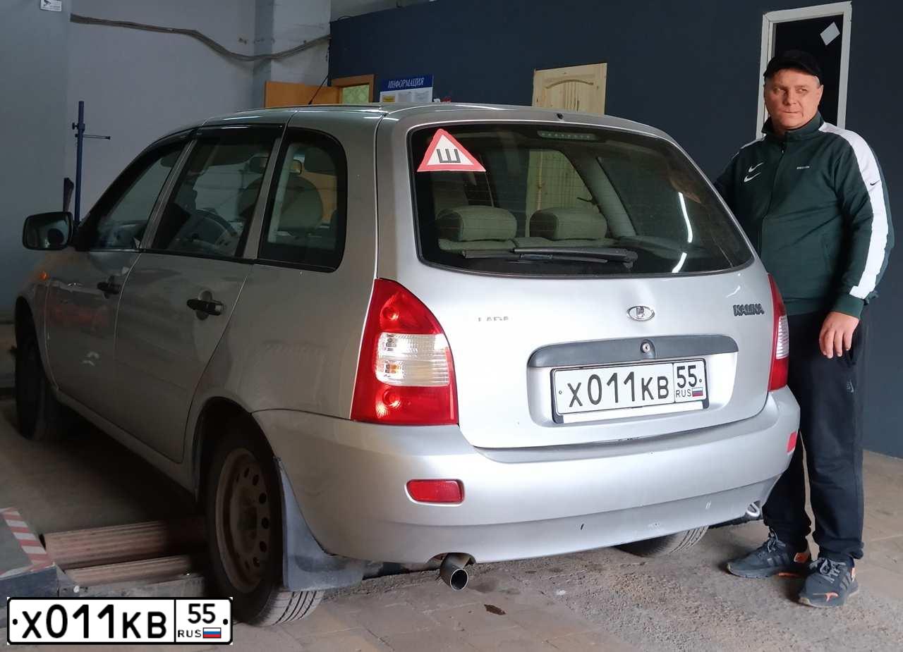 Фото автомобиля LADA 1117 KALINA, 2012 — госномер Р152ХУ55. Цвет: СЕРЕБРИСТЫЙ
