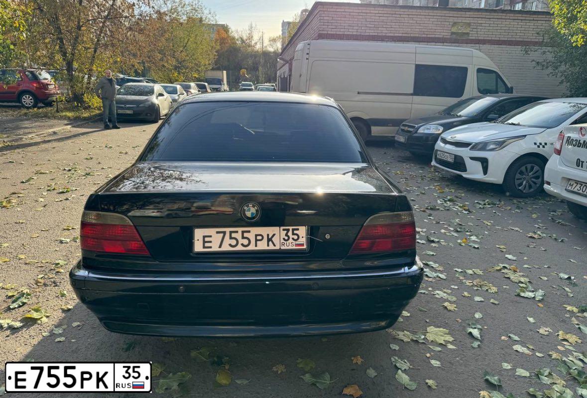 Фото автомобиля BMW W SERIE 7, 1994 — госномер Е755РК35. Цвет: ЧЕРНЫЙ
