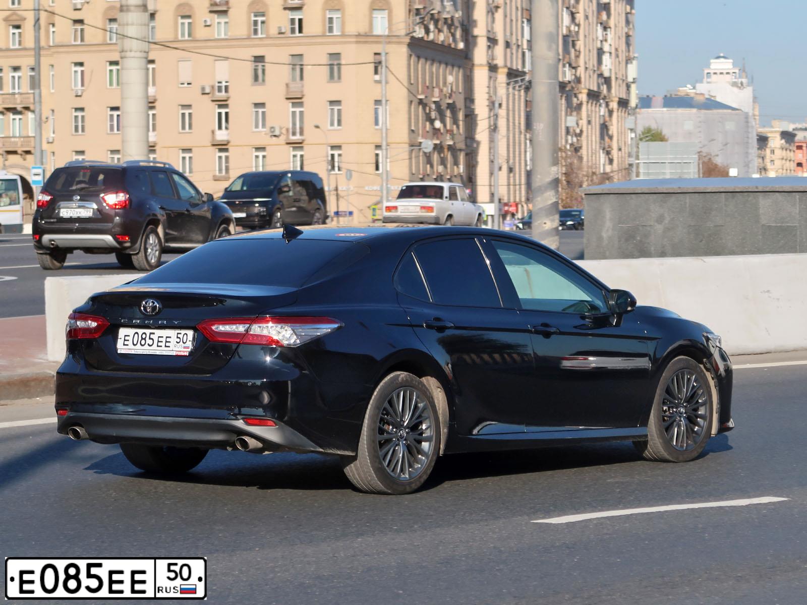 Фото автомобиля ГАЗ 2411, 1991 — госномер Е085ЕЕ50. Цвет: БЕЖЕВЫЙ