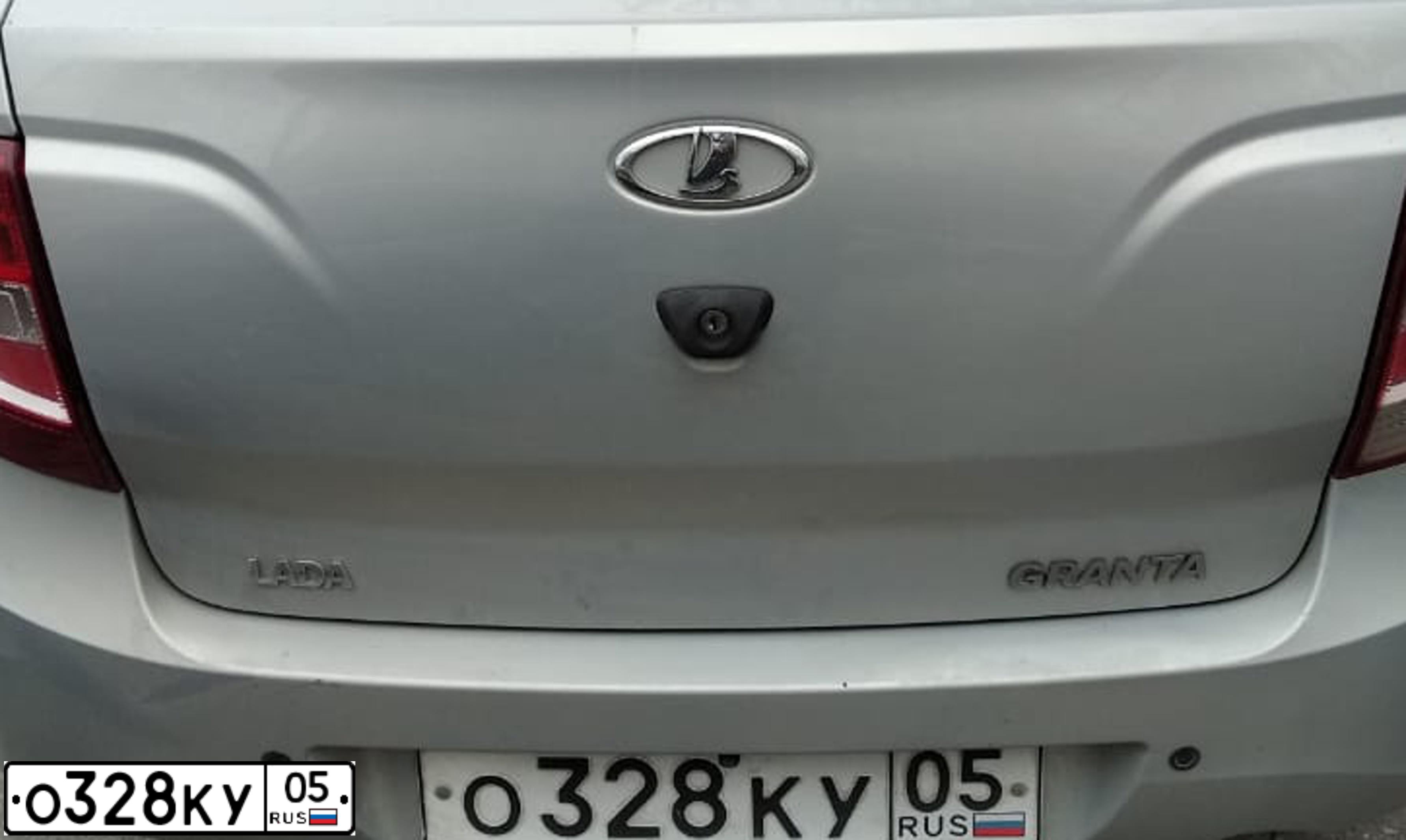 Фото автомобиля LADA 2190 GRANTA, 2013 — госномер О328КУ05. Цвет: (БЕЛЫЙ)СЕРЕБРИСТЫЙ