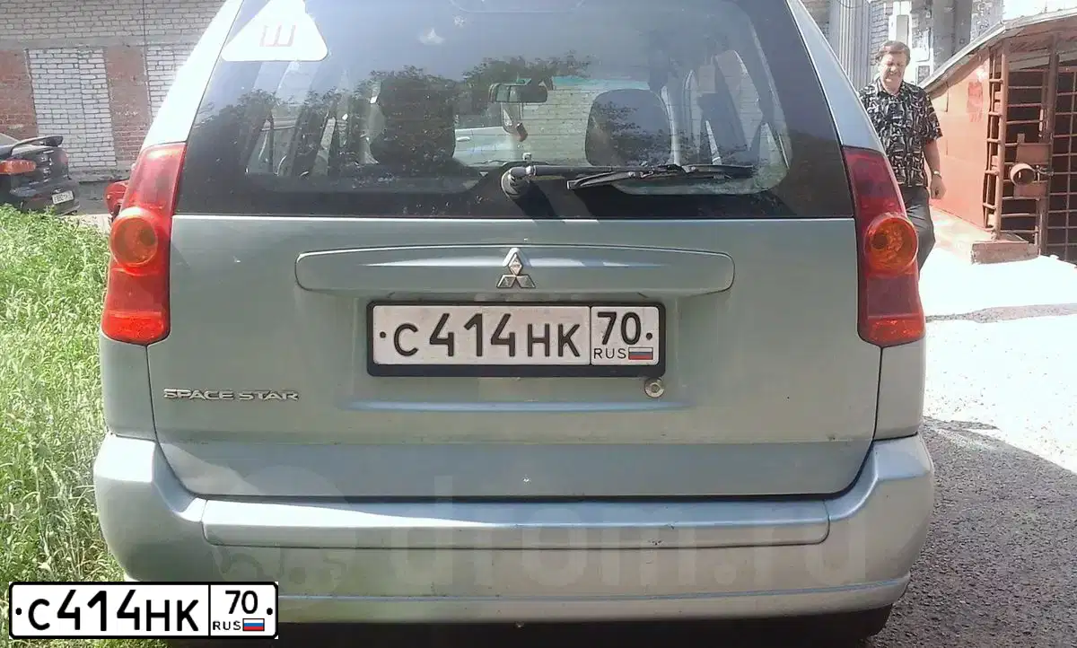 Фото автомобиля MITSUBISHI SPACE STAR, 2004 — госномер С414НК70. Цвет: СЕРО-ЗЕЛЕНЫЙ