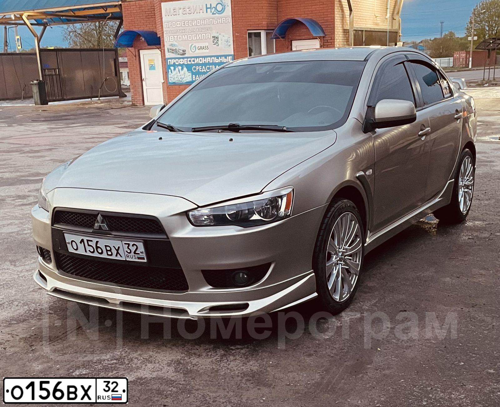 Фото автомобиля MITSUBISHI LANCER, 2008 — госномер О156ВХ32. Цвет: БЕЖЕВЫЙ