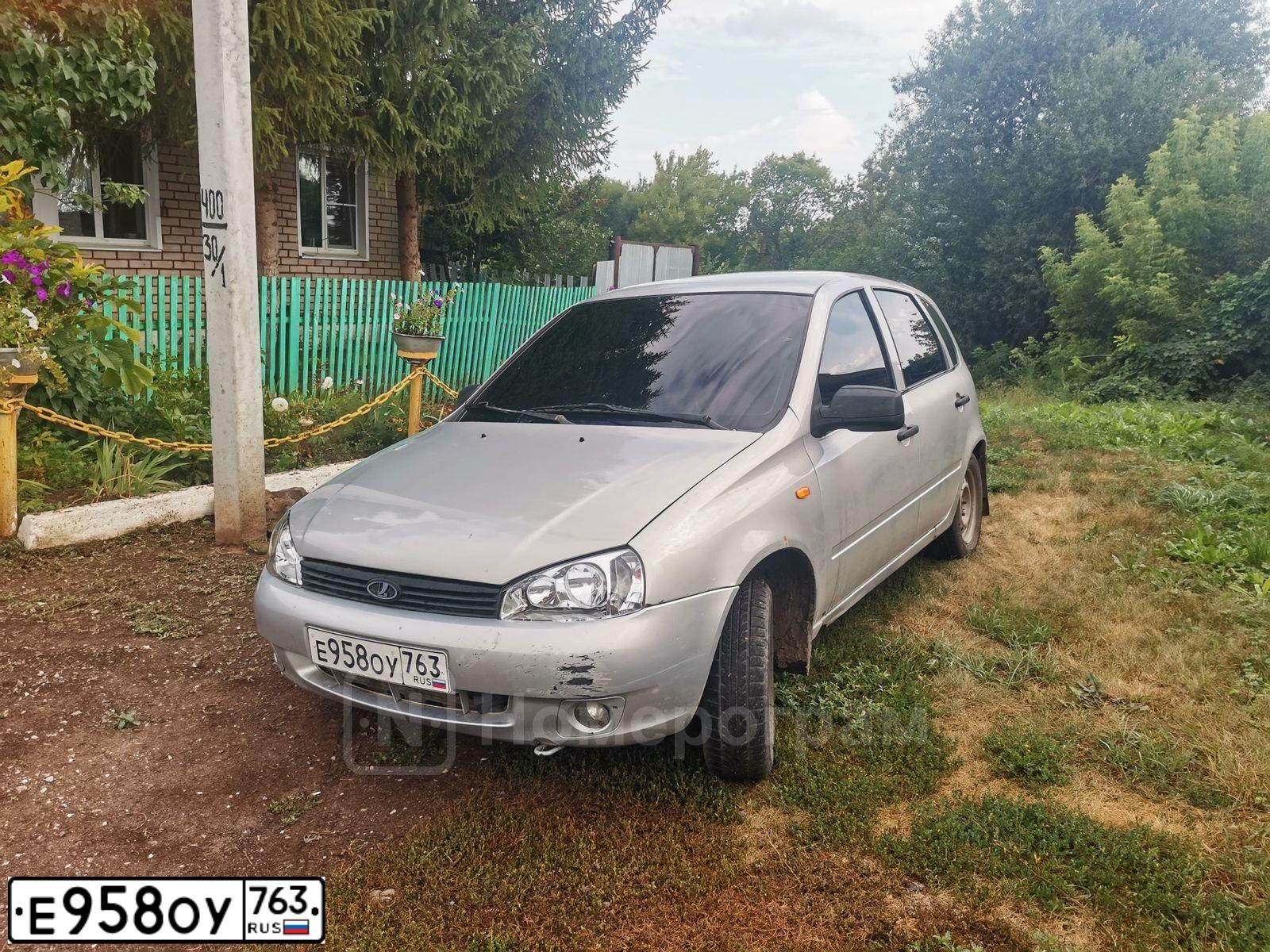 Фото автомобиля LADA 1119 KALINA, 2011 — госномер Е958ОУ763. Цвет: Серебристый