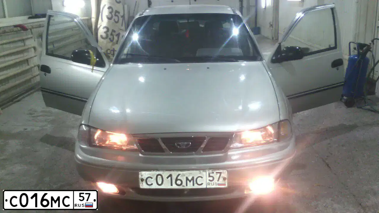 Фото автомобиля DAEWOO NEXIA, 2008 — госномер А786ХА123. Цвет: Серебристый