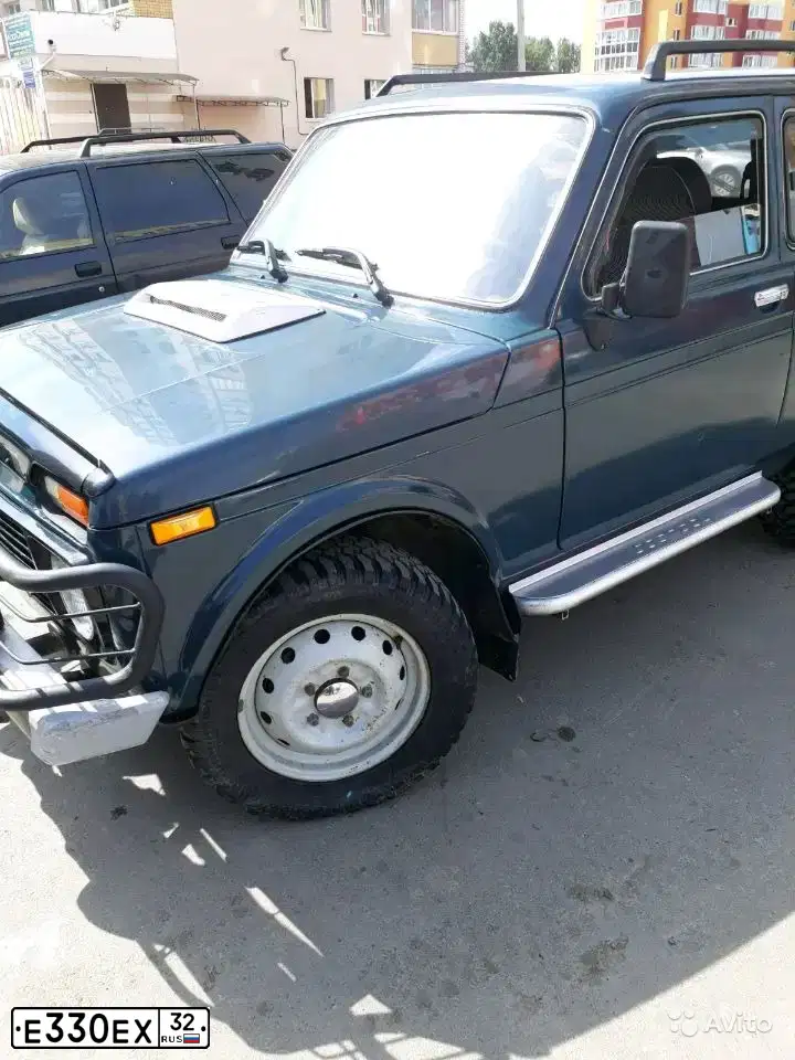 Фото автомобиля LADA 2121 NIVA, 2000 — госномер Е359ЕХ32. Цвет: Сине-зеленый