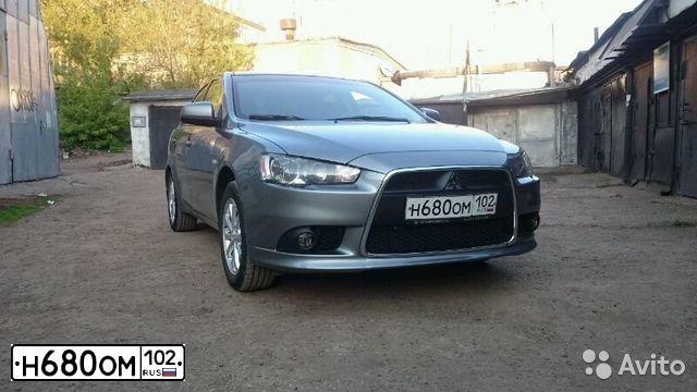 Фото автомобиля MITSUBISHI LANCER, 2012 — госномер Е683СР73. Цвет: Серый