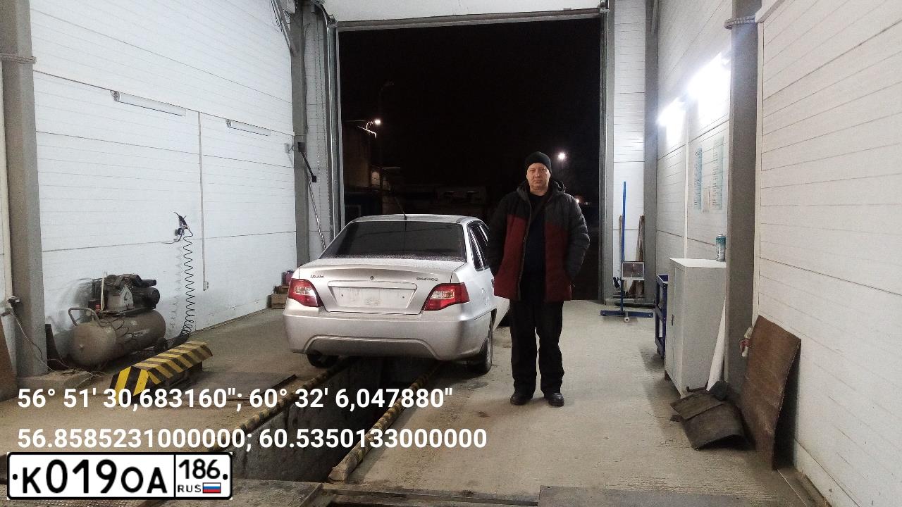 Фото автомобиля DAEWOO NEXIA, 2011 — госномер Н335НК45. Цвет: СЕРЫЙ