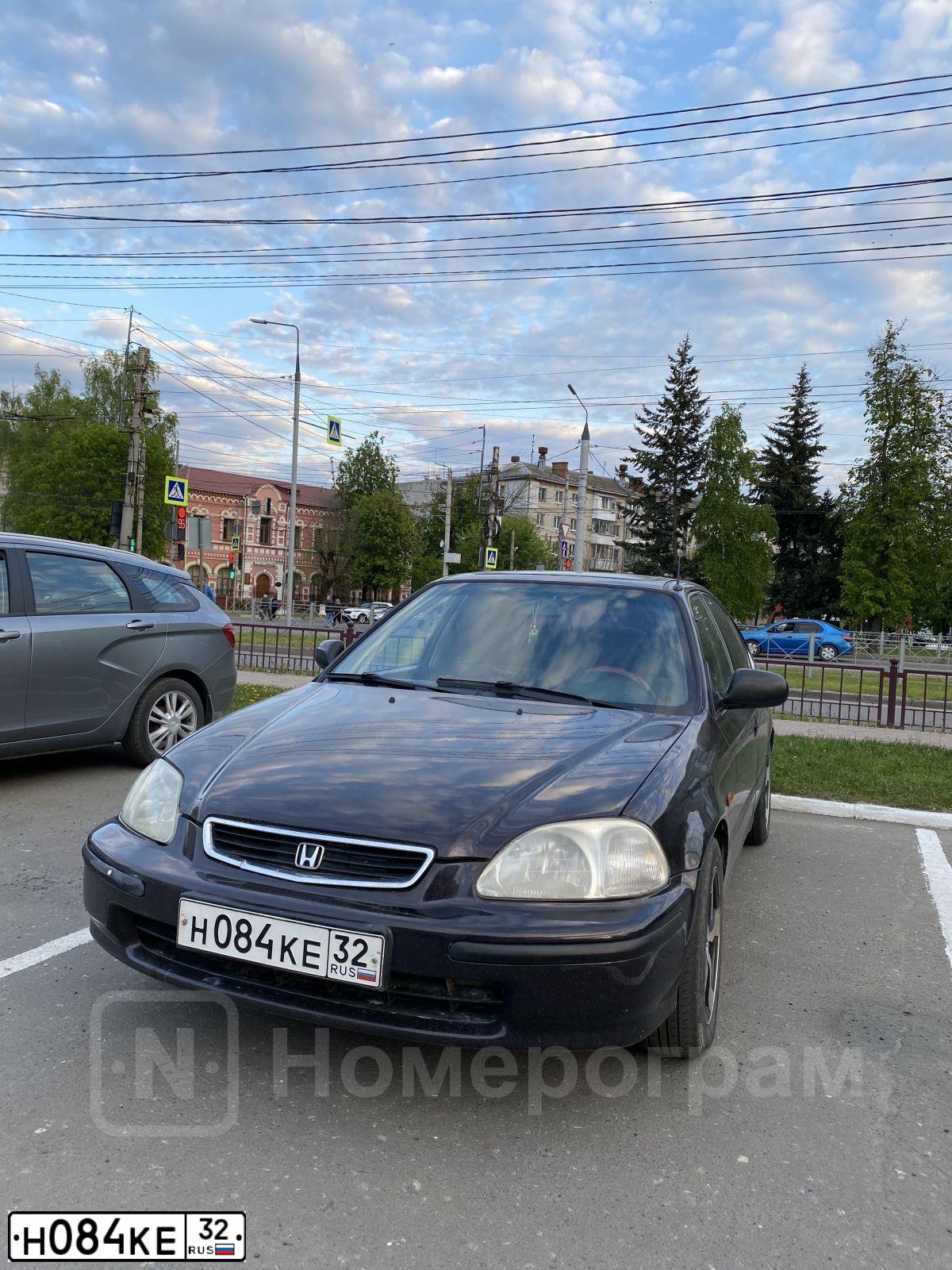 Фото автомобиля HONDA CIVIC, 1997 — госномер А337КМ977. Цвет: Фиолетовый