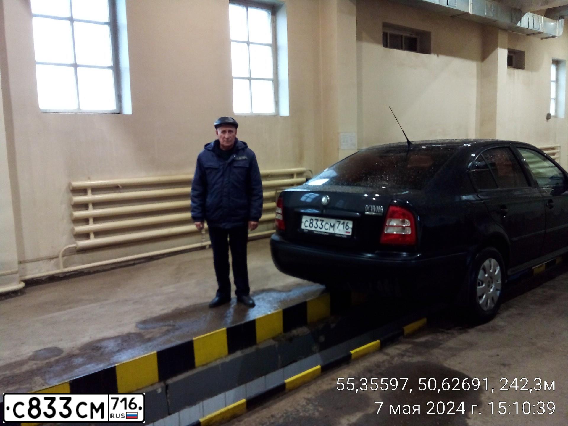 Фото автомобиля SKODA OCTAVIA, 2007 — госномер Н343ЕВ774. Цвет: ЧЕРНЫЙ