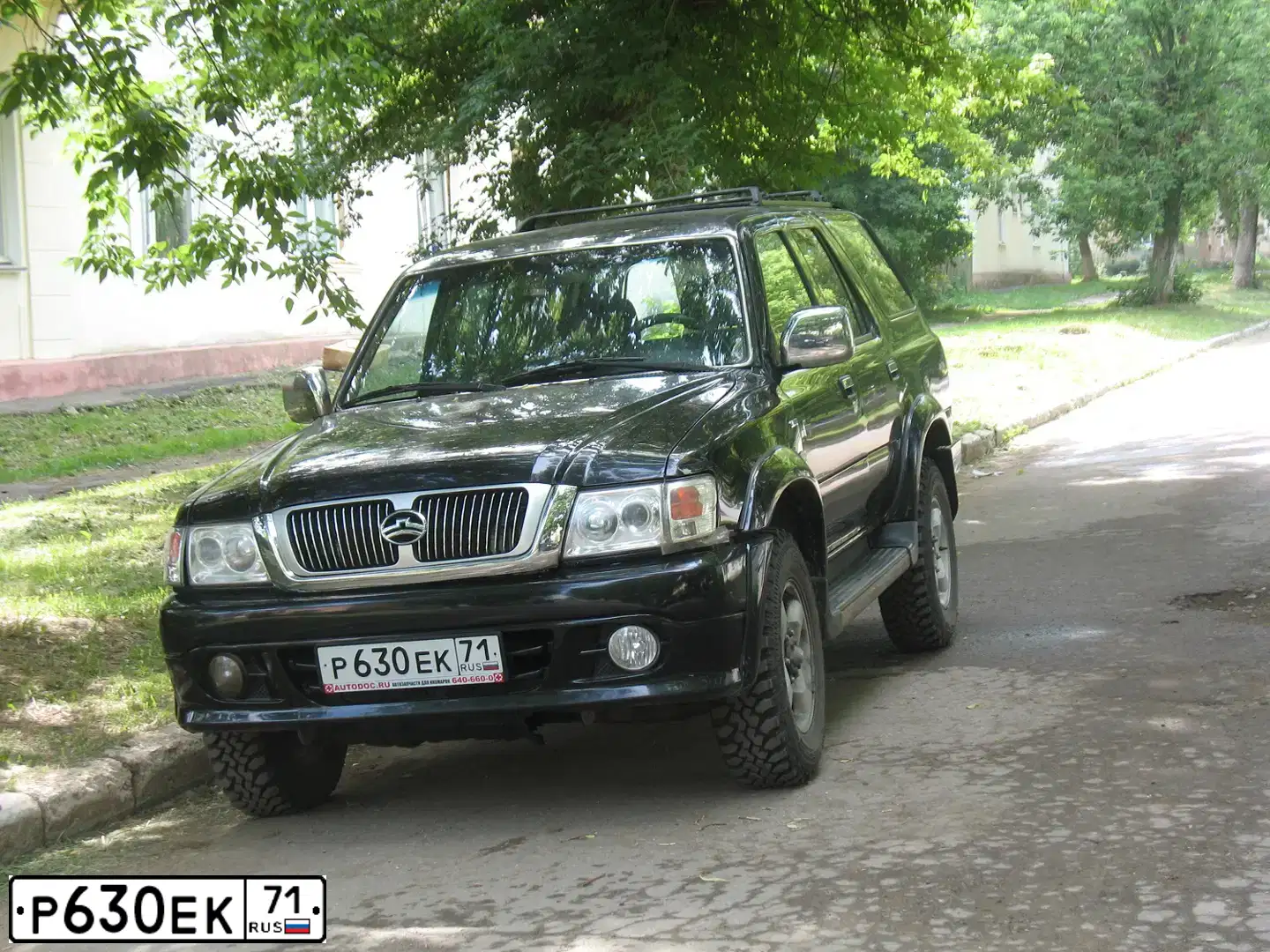 Фото автомобиля GREAT WALLCC6460DY, 2007 — госномер Х962ЕС198. Цвет: ЧЕРНЫЙ