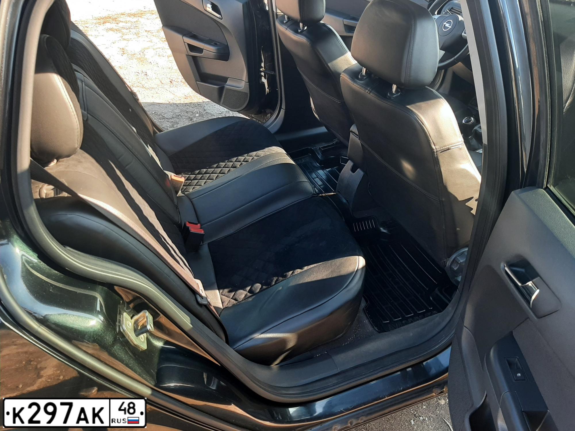 Фото автомобиля OPEL ASTRA, 2011 — госномер К297АК48. Цвет: ЧЕРНЫЙ