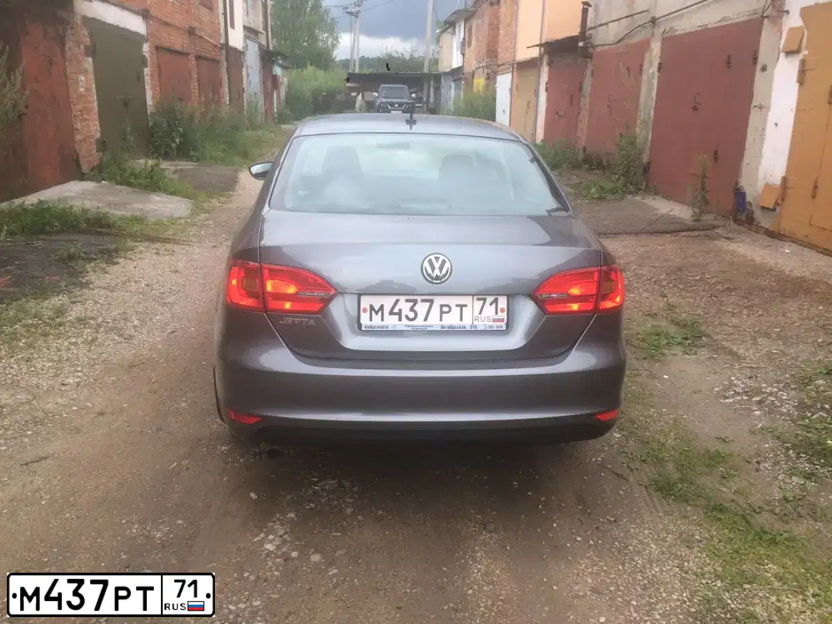 Фото автомобиля VOLKSWAGEN JETTA, 2012 — госномер Х812ВВ57. Цвет: ТЕМНО-СЕРЫЙ