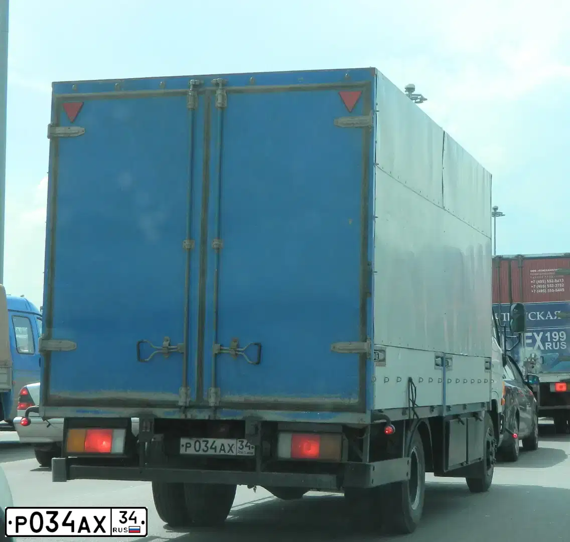 Фото автомобиля HYUNDAI MIGHTY, 2008 — госномер Р034АХ34. Цвет: БЕЛЫЙ