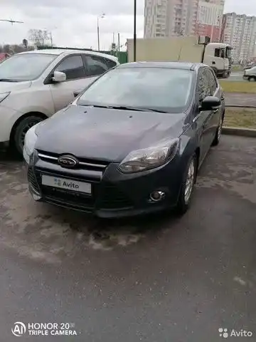 Фото автомобиля FORD FOCUS, 2012 — госномер К373АМ77. Цвет: СЕРЫЙ ТЕМНЫЙ
