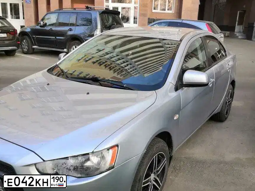 Фото автомобиля MITSUBISHI LANCER, 2010 — госномер С707НО152. Цвет: СЕРЕБРИСТЫЙ
