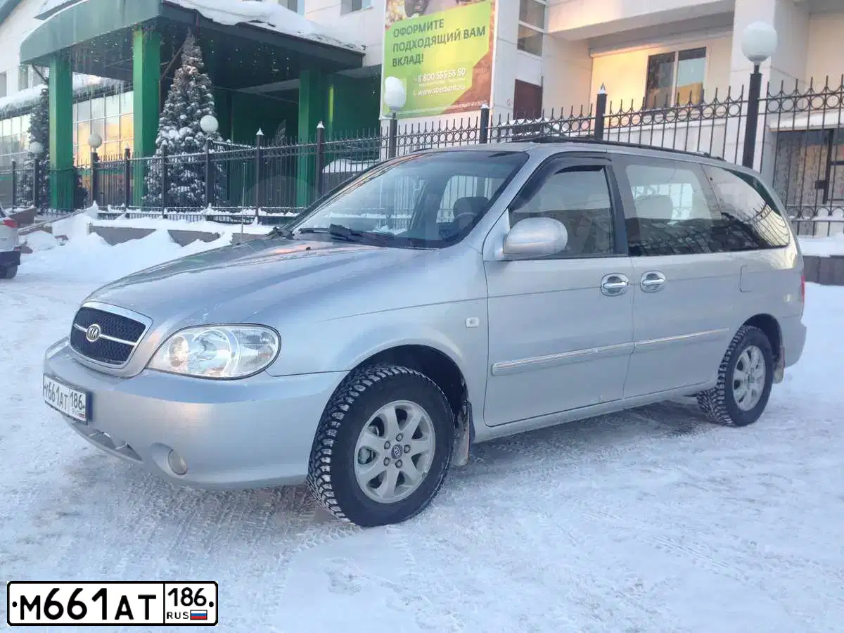 Фото автомобиля MITSUBISHI OUTLANDER, 2015 — госномер М661АТ186. Цвет: СЕРЕБРИСТЫЙ